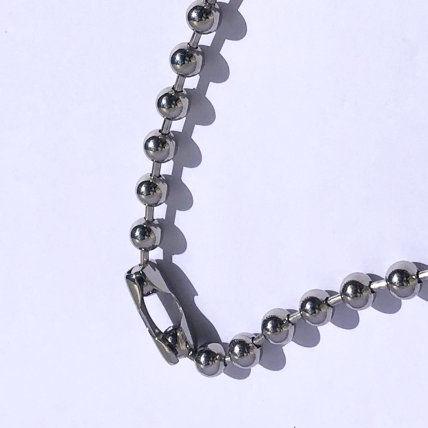 Cadena bolas broche plateda