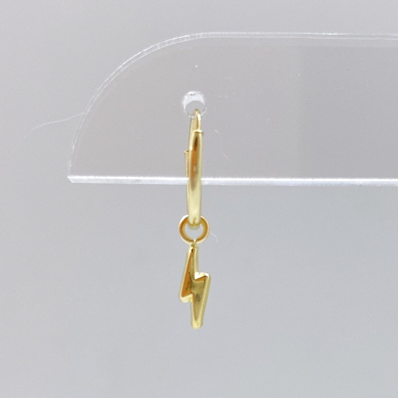 Arracada rayo Oro 10k